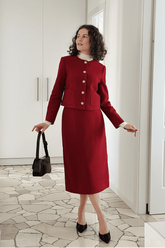 a lady in a red crop jacket and skirt two-piece set